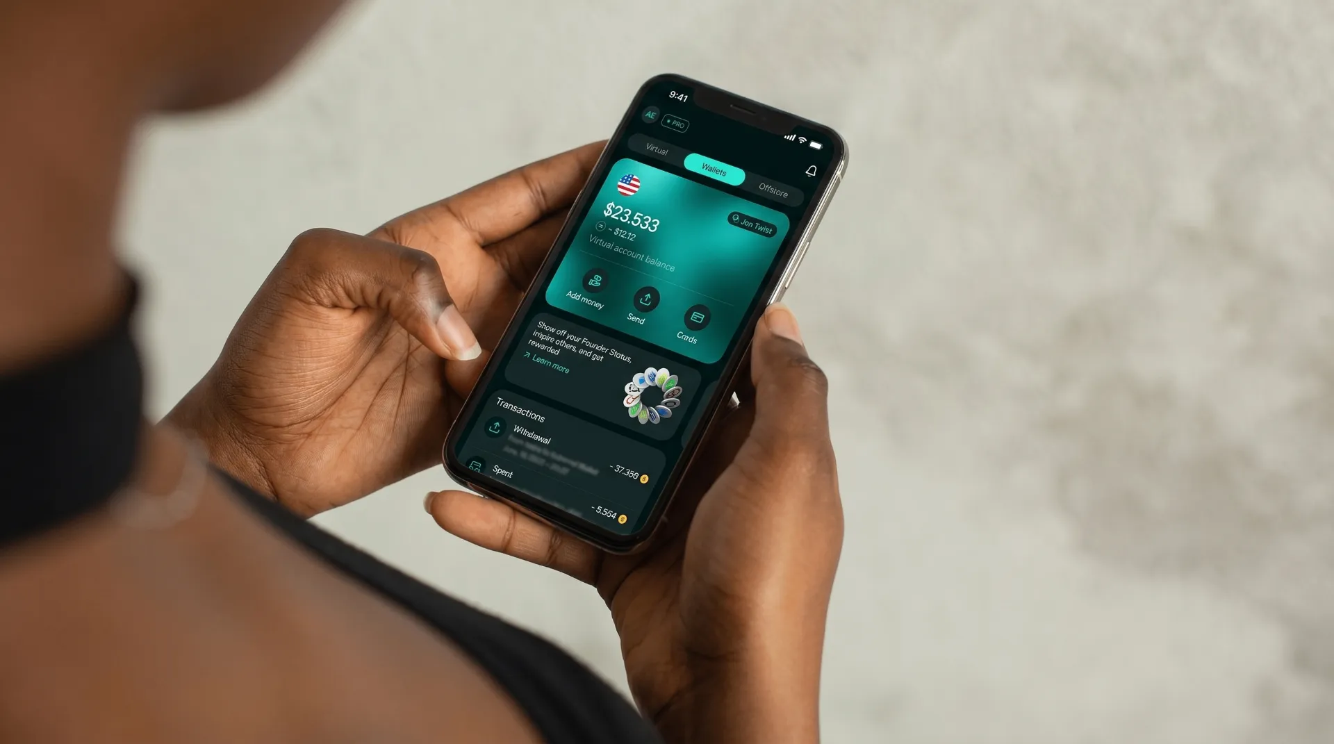 Hand holding phone showing Nummus offshore account